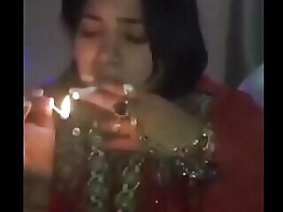 Indian dipsomaniac chick misapplied jaw back smoking smoking